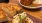 a couple plates of food on a table
