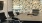 a conference room with a table and chairs
